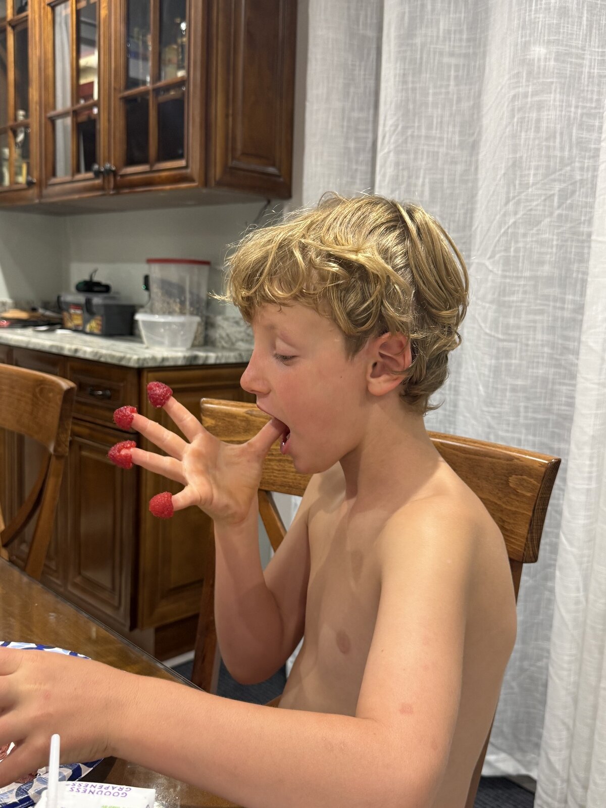The Nicoli family cooking together in their kitchen